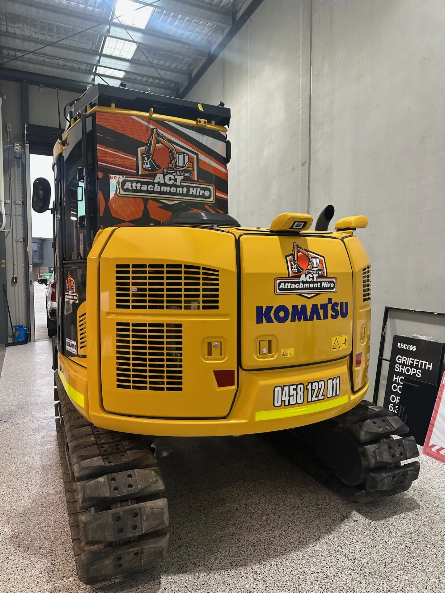 Excavator, rear view, in the yard